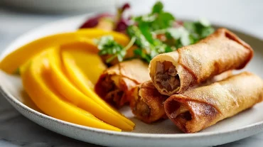Savoureux nems au canard et mangue cuits à l’Airfryer, croustillants et pleins de saveurs.