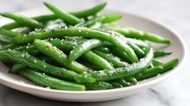 Haricots surgelés cuits à la perfection en Airfryer, colorés et savoureux.